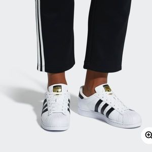 Men’s Adidas Superstar shoes.